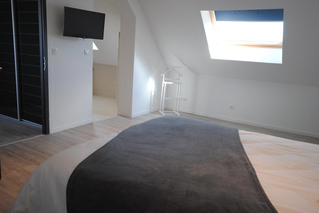 Chambres D'Hotes Les Ecuries De La Source Amiens Habitación foto
